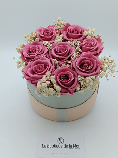 Candy box with eternal vintage pink roses and preserved flowers.